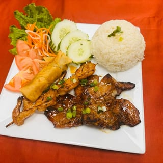 37-GRILLED SHRIMP, PORK CHOP AND SPRING ROLL ON RICE - COM TOM SUON CHA GIO